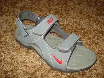 Шльопанці Nike (57 фото): жіночі шльопанці “Найк”, моделі Solarsoft slide, сандалі, які робляться ляпанцями