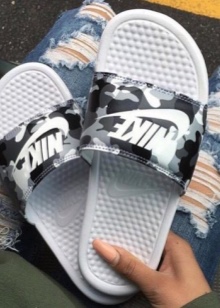 Шльопанці Nike (57 фото): жіночі шльопанці “Найк”, моделі Solarsoft slide, сандалі, які робляться ляпанцями