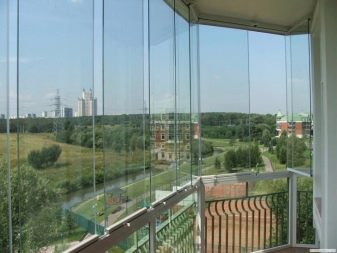 Безрамне скління балконів (32 фото): плюси і мінуси скління балконів без рам. Особливості технології