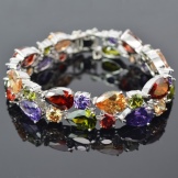 Браслет Swarovski (66 фото): модель зоряний пил, нова колекція з кристалами і камінням, жорсткий зі стразами і підвісками