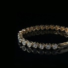 Браслет Swarovski (66 фото): модель зоряний пил, нова колекція з кристалами і камінням, жорсткий зі стразами і підвісками