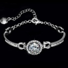 Браслет Swarovski (66 фото): модель зоряний пил, нова колекція з кристалами і камінням, жорсткий зі стразами і підвісками