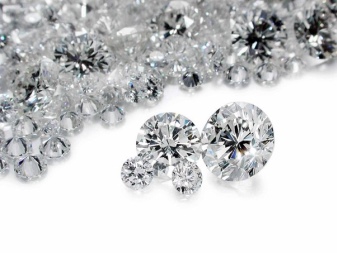 Браслет Swarovski (66 фото): модель зоряний пил, нова колекція з кристалами і камінням, жорсткий зі стразами і підвісками