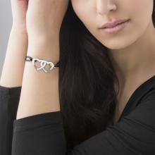 Браслет Swarovski (66 фото): модель зоряний пил, нова колекція з кристалами і камінням, жорсткий зі стразами і підвісками