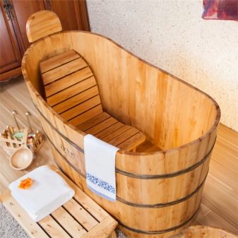 Дерев’яні ванни (53 фото): плюси і мінуси ванн з дерева та поради з вибору