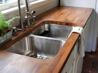 Дерев’яна стільниця для кухні (40 фото): моделі з масиву дуба, бука, модрини та інші, плюси і мінуси кухонних стільниць з натурального дерева