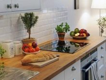 Дерев’яна стільниця для кухні (40 фото): моделі з масиву дуба, бука, модрини та інші, плюси і мінуси кухонних стільниць з натурального дерева