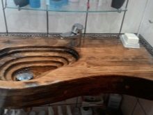 Дерев’яна стільниця у ванну: вибір під раковину стільниці з слябів, масиву і з інших матеріалів