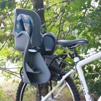 Дитяче велокрісло на багажник: як вибрати заднє дитяче крісло для велосипеда для перевезення дитини на підсідельну трубу? Велосиденье з амортизаторами та інші види