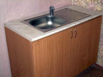 Кухонні тумби (53 фото): підлогові тумби зі стільницею, вузькі кутові тумби з висувними шухлядами на кухню, розміри тумб-шаф і інших моделей